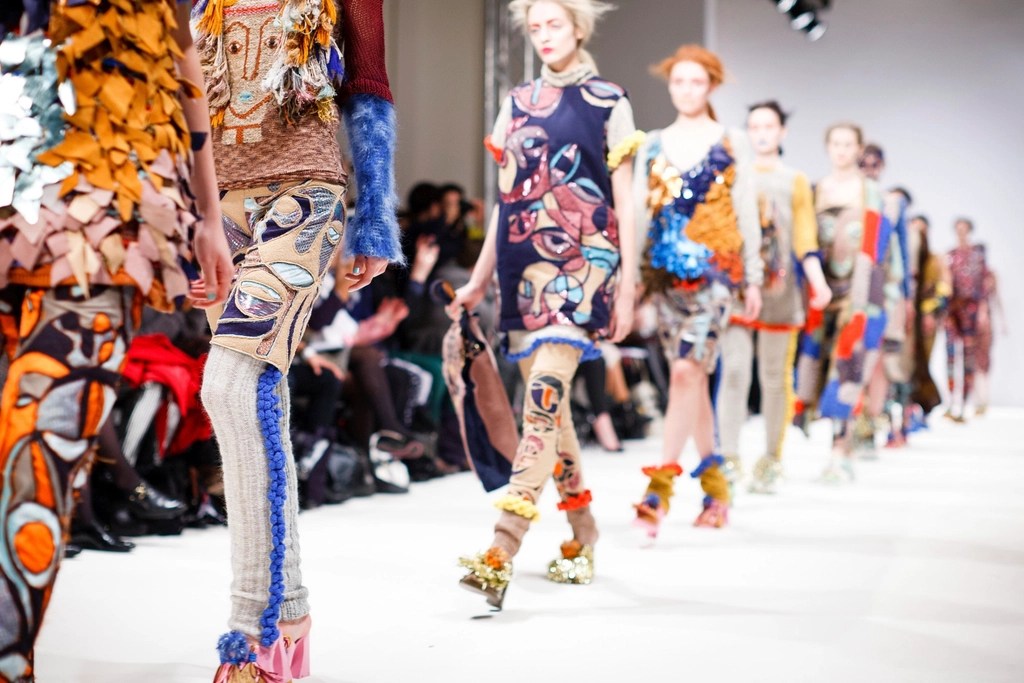 Models walking a fashion show runway