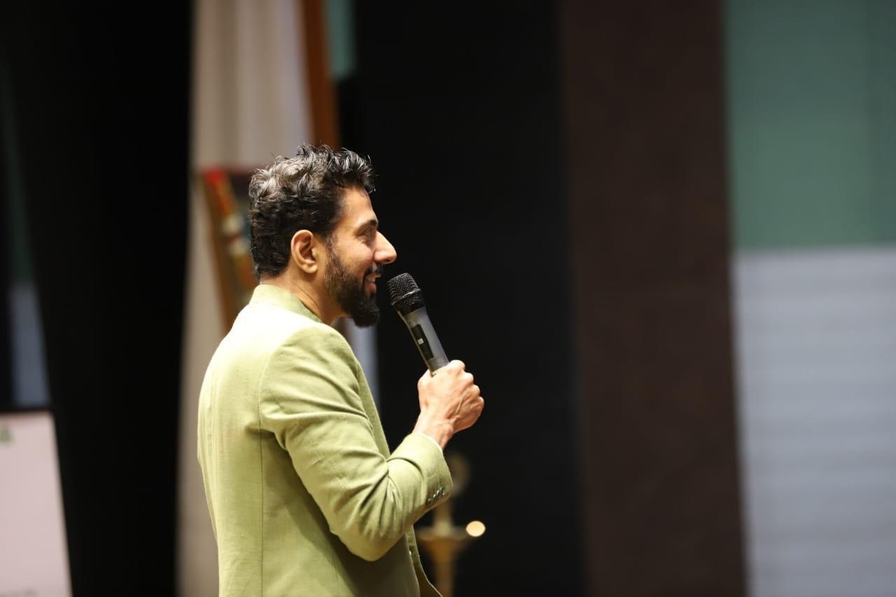 Chef Ranveer Brar speaking on stage at a Youth Global event