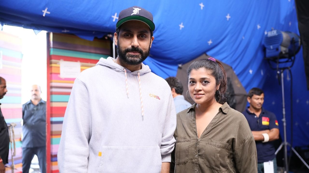 On set with Abhishek Bachchan, between takes