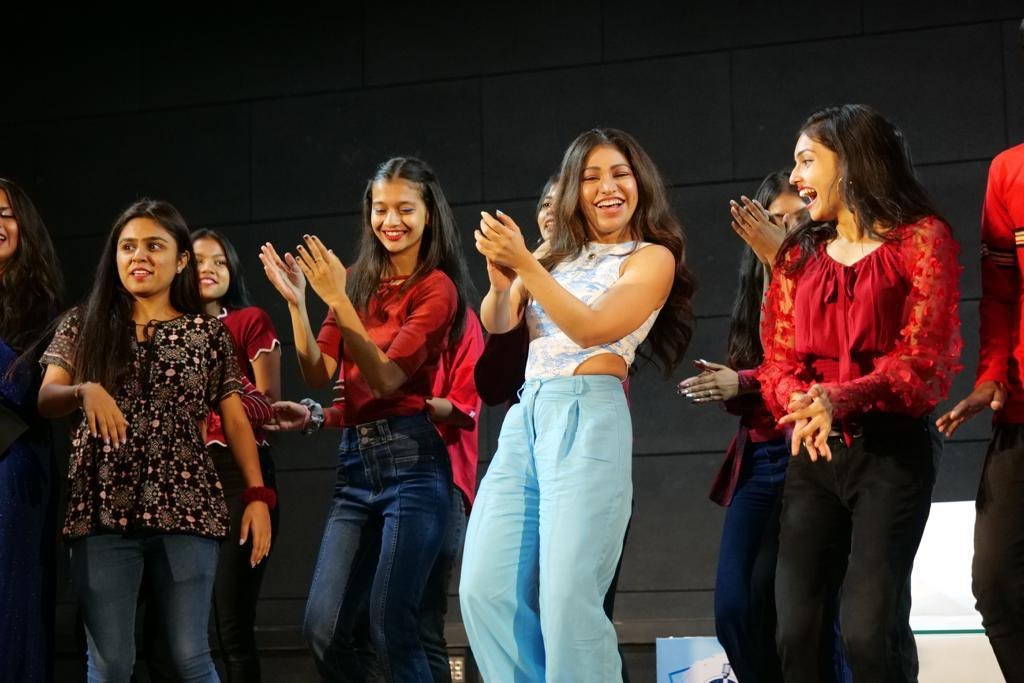 Students on stage at a Youth Talkies event