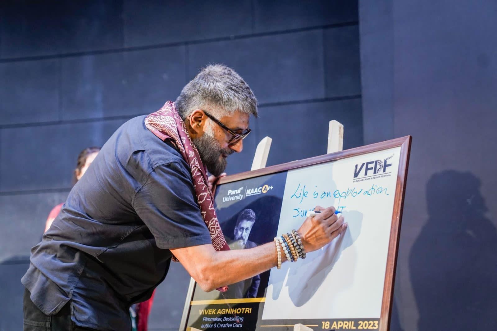 Vivek Agnihotri signing the guest board at the Vadodara Film & Design Festival